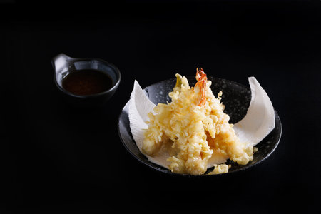 Shrimp tempura Japanese food isolated on a black backgroundの写真素材