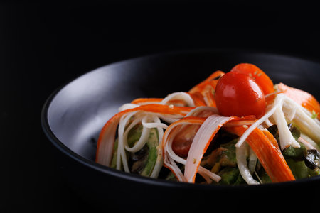 Japanese salad isolated in black backgroundの写真素材