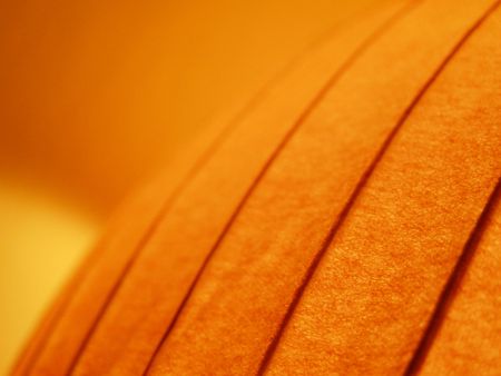 orange paper lamp with linesの写真素材