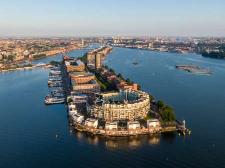 Aerial view of KNSM island and Emerald Empire residential building in Amsterdam, Netherlandsの写真素材