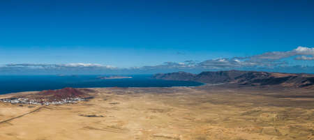 Aerial view of El Jable desert and and Risco de Famara mountains, Lanzarote, Spainの写真素材