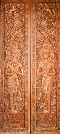 Thai Style Carving on the Temple Door の写真素材