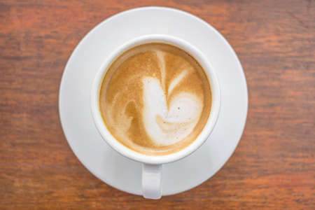coffee cup on wooden tableの写真素材