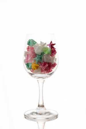 Paper stars in  glass   on white backgroundの写真素材