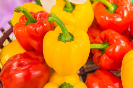 colorful bell peppers, natural backgroundの写真素材