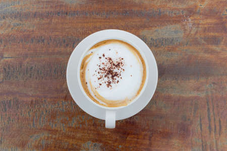 Hot Coffee cup on Wooden Tableの写真素材