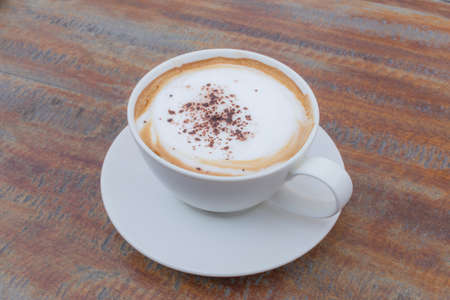Hot Coffee cup on Wooden Tableの写真素材