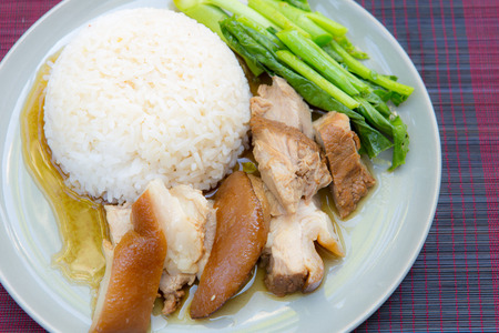 stewed pork leg with rice and kaleの写真素材