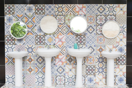 Handbasin and mirror in toiletの写真素材
