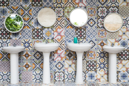 Handbasin and mirror in toiletの写真素材