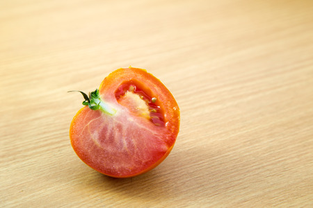 fresh Tomatoes on a woodden  backgroundの写真素材