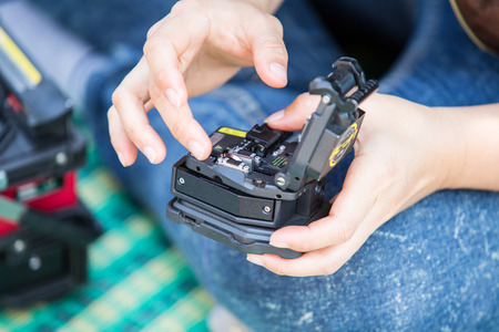 fiber optic fusion splicer in fieldの写真素材