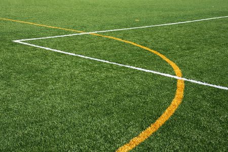 Artificial turf field, showing yellow and white linesの写真素材