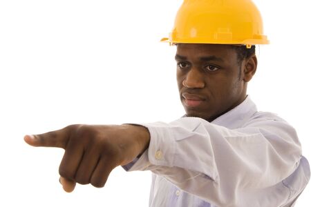A black worker pointing with his finger to someoneの写真素材
