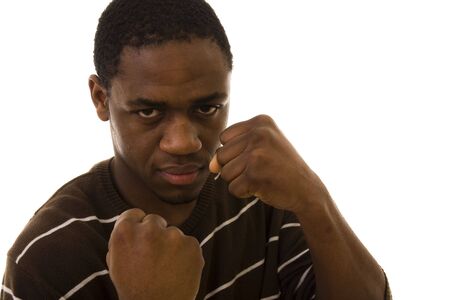 A portrait of a young man ready to fight