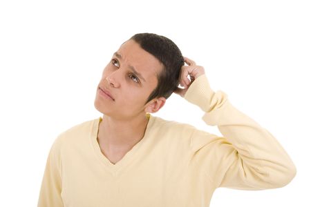 Young man with a pensive expression looking upの写真素材