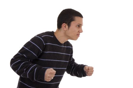 Furious young man isolated on a white backgroundの写真素材