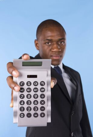 Business man showing a silver calculatorの写真素材