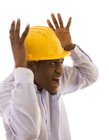 Young Black worker with a fear expressionの写真素材