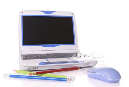 Student laptop with colorful pencils isolated on whiteの写真素材