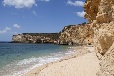 View of a beautiful and desert beach in Algarve - Portugalの写真素材