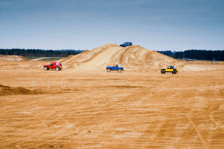 Rally car speeding through the dusty conditions at high speedの写真素材