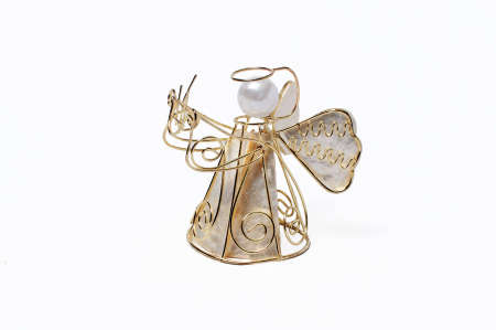 A Christmas Angel made of gold wire on a white backgroundの写真素材