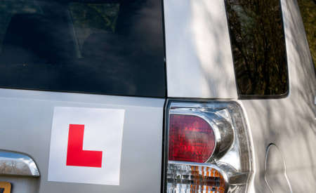A car with the L plates on ready for a new driver to useの写真素材