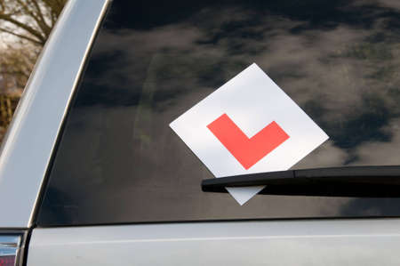 A car with the L plates on ready for a new driver to useの写真素材