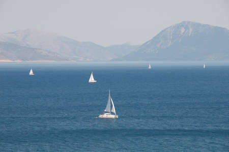 photo of sailboats in the seas around the Greece islands