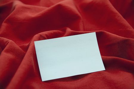 Invitation in red backgroundの写真素材