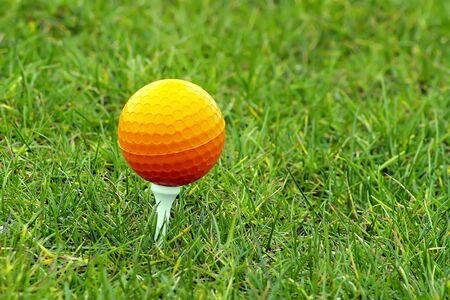 Beautiful golf ball in grass with great colorsの写真素材