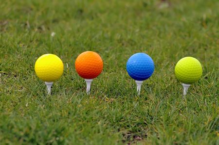 Beautiful golf ball in grass with great colorsの写真素材