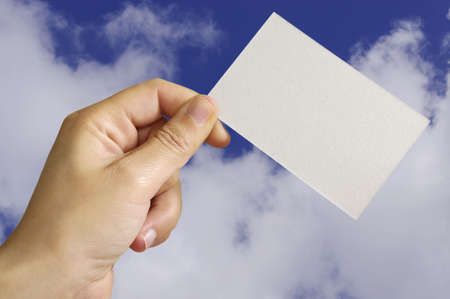 Empty card in human hand with great colorsの写真素材