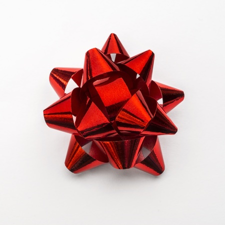 Red bow in white background