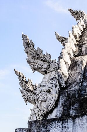 King of White Naga with Blue Sky in Temple, Thailandの写真素材