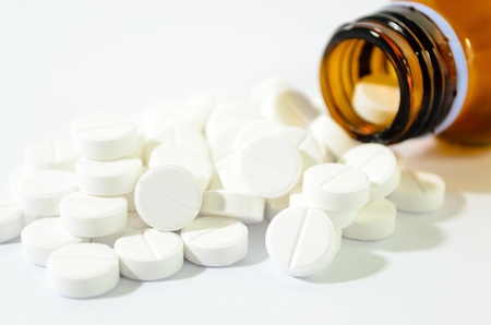 Pills Spilling out of Pill Bottle Shallow DOFの写真素材