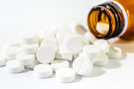 Pills Spilling out of Pill Bottle Shallow DOFの写真素材