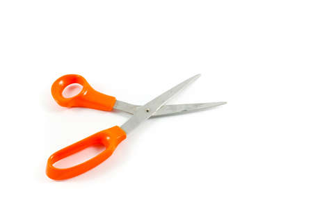 Old orange scissor isolated on a white backgroundの写真素材