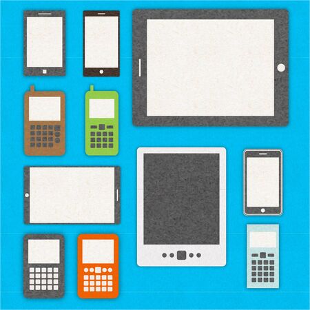 Set of mobile phones and tablets ,recycled papercraft backgroundの写真素材