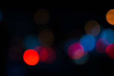 Photo of bokeh lights on black backgroundの写真素材