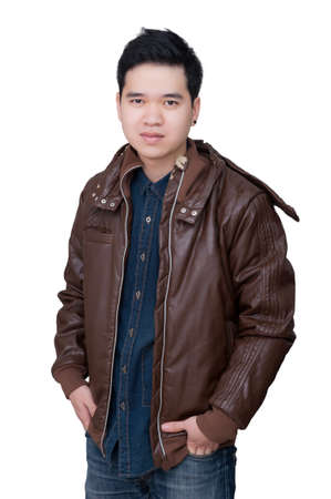 Portrait of asian man wearing jeans shirt and leather jacket, close up shot on white background の写真素材