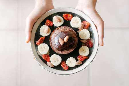 Handmade breakfast chocolate souffle and fruitsの写真素材