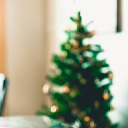 Blur shot decorate Christmas tree using as background in coffee shop using as background - vintage effect style picturesの写真素材