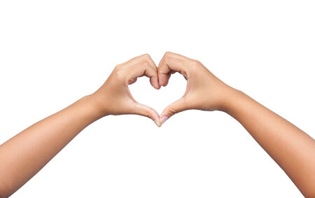 hands in the form of heart isolated on white backgroundの写真素材
