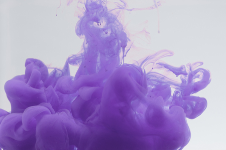 Acrylic colors and ink in water. Abstract  background. Isolated on white.の写真素材