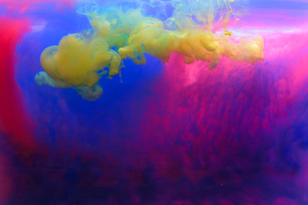 Acrylic colors and ink in water. Abstract  background. Isolated on white.の写真素材