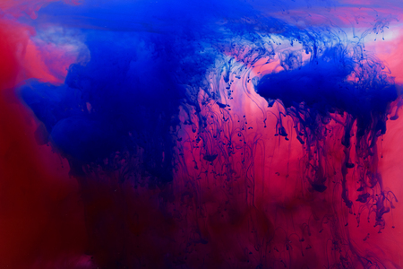 Acrylic colors and ink in water. Abstract  background. Isolated on white.の写真素材