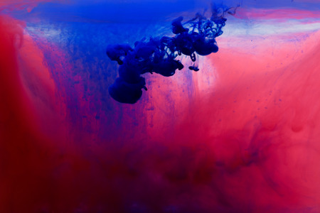Acrylic colors and ink in water. Abstract  background. Isolated on white.の写真素材