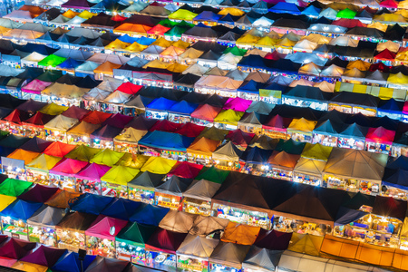 Market with colorful tents in sunset time. This is place in Thailand call Train Market (Talad Rod Fai).のeditorial素材